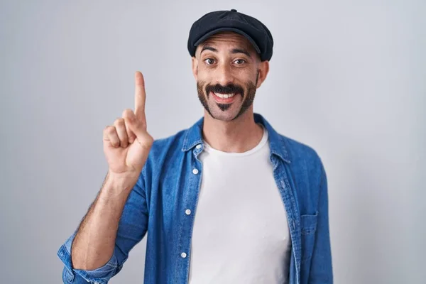 Hispanic Man Beard Standing Isolated Background Showing Pointing Finger Number — Stock Photo, Image