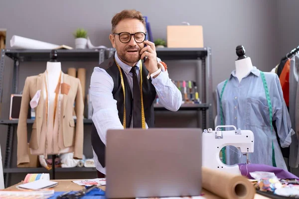 Middle Age Man Tailor Talking Smartphone Using Laptop Atelier — Stock Photo, Image