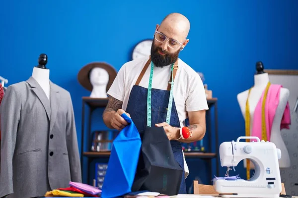 Young Bald Man Tailor Holding Cloths Clothing Factory — Stock Photo, Image
