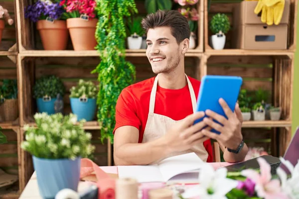 Young Hispanic Man Florist Smiling Confident Using Touchpad Flower Shop — Stock Photo, Image