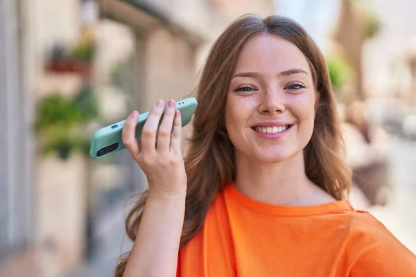 Young Woman Smiling Confident Listening Audio Message Smartphone Street — ストック写真
