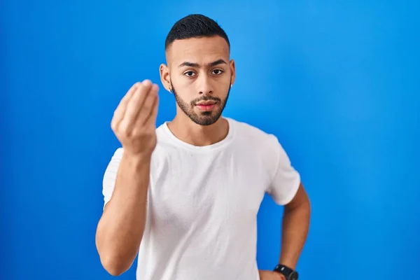 Young Hispanic Man Standing Blue Background Doing Italian Gesture Hand — Fotografia de Stock