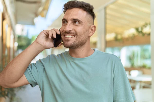 Young Hispanic Man Smiling Confident Talking Smartphone Coffee Shop Terrace — Stock Fotó