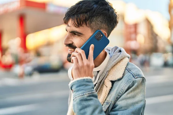 Young Hispanic Man Talking Smartphone Wearing Headphones Street — Stock Fotó