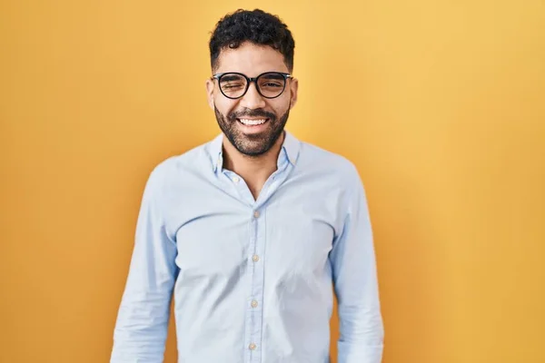 Hispanic Man Beard Standing Yellow Background Winking Looking Camera Sexy — Stock Photo, Image