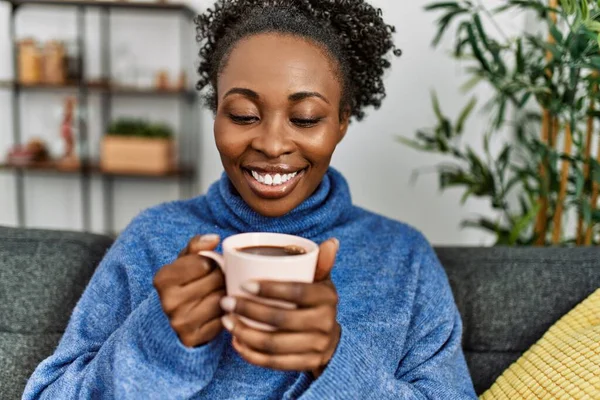 African American Woman Drinking Coffee Sitting Sofa Home — Photo