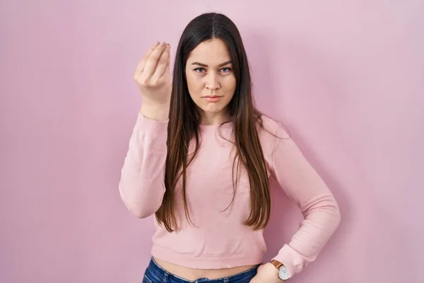 Young Brunette Woman Standing Pink Background Doing Italian Gesture Hand — Foto Stock