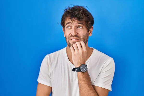 Hispanic Young Man Standing Blue Background Looking Stressed Nervous Hands — 스톡 사진