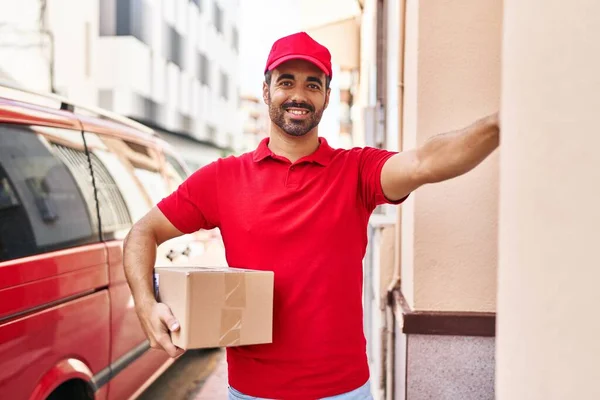 Young Hispanic Man Courier Holding Package Press Doorbell Street — Stock Photo, Image