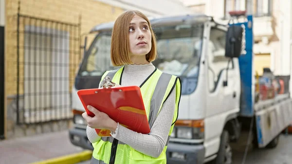 Young Blonde Woman Builder Writing Document Street — Stock Photo, Image