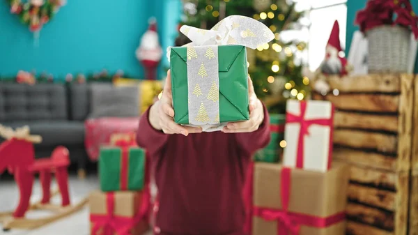 Young Hispanic Man Holding Christmas Gift Face Home — Stock Photo, Image