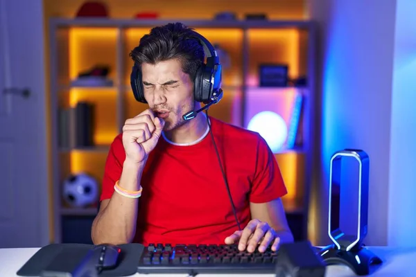 Young Hispanic Man Playing Video Games Feeling Unwell Coughing Symptom — Stok fotoğraf