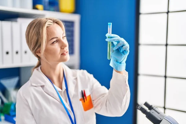 Young Blonde Woman Scientist Holding Test Tube Laboratory — Stock Photo, Image