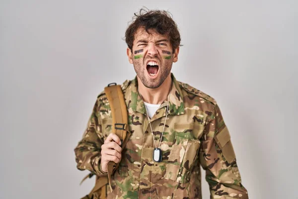 Hispanic Young Man Wearing Camouflage Army Uniform Angry Mad Screaming — Stockfoto