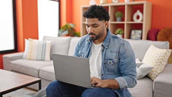 African American Man Using Laptop Sitting Sofa Home — Fotografia de Stock