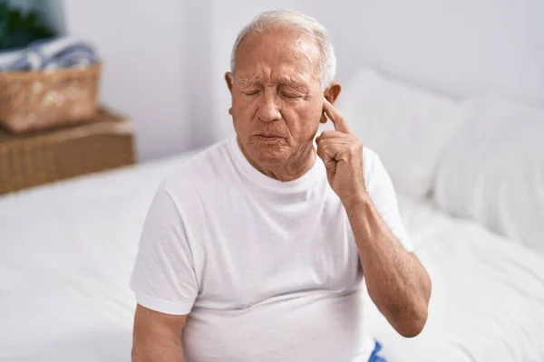 Senior Grey Haired Man Sitting Bed Suffering Ear Pain Bedroom — Stock Photo, Image