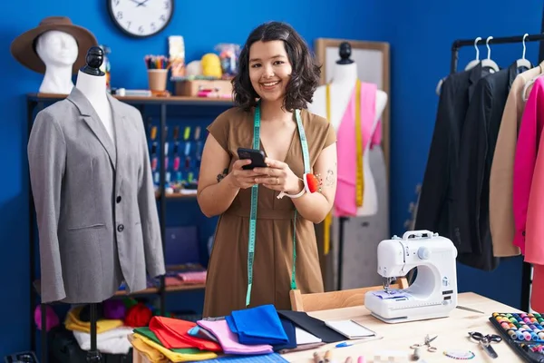 Young Woman Tailor Smiling Confident Using Smartphone Sewing Studio — Stock Fotó