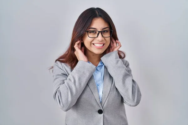 Hispanic Young Business Woman Wearing Glasses Covering Ears Fingers Annoyed — Stock Photo, Image