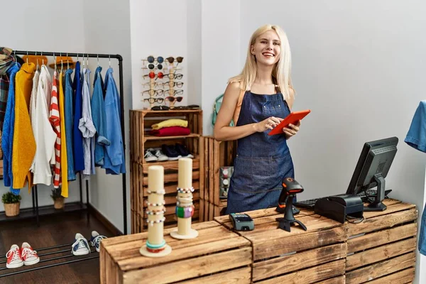 Young Blonde Woman Shop Assistant Using Touchpad Smiling Clothing Store — Stock Photo, Image