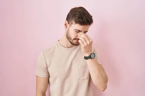 Hispanic Man Beard Standing Pink Background Tired Rubbing Nose Eyes — Foto de Stock