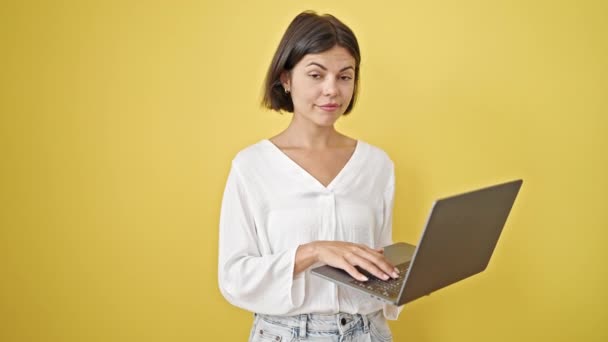 Young Beautiful Hispanic Woman Smiling Confident Using Laptop Isolated Yellow — Stock Video