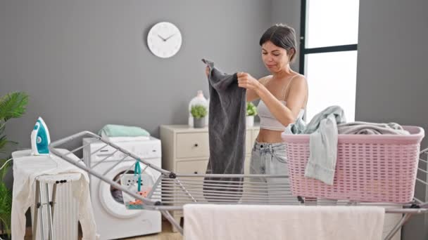 Young Beautiful Hispanic Woman Smiling Confident Hanging Clothes Clothesline Laundry — Stock Video