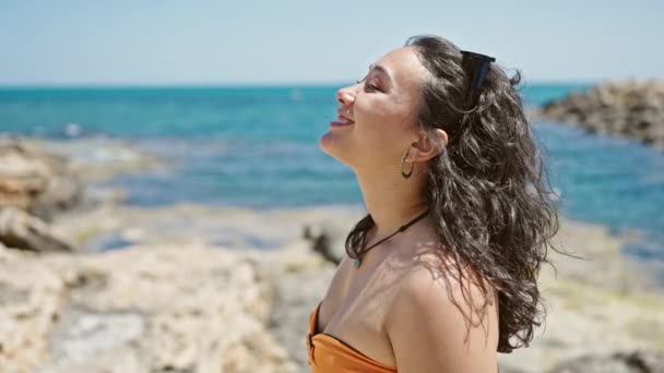 Young Beautiful Hispanic Woman Tourist Wearing Bikini Breathing Beach — Stock videók