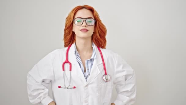Young Redhead Woman Doctor Smiling Confident Standing Isolated White Background — Stock Video