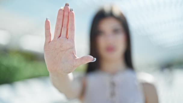 Young Caucasian Woman Doing Stop Gesture Hand Park — Vídeos de Stock