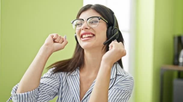 Young Caucasian Woman Business Worker Wearing Headset Winner Gesture Office — Stock Video
