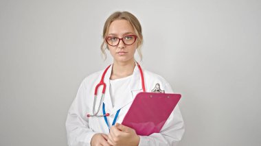 Young blonde woman doctor holding clipboard over isolated white background