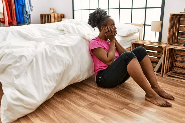 African American Woman Stressed Sitting Floor Bedroom — Stock fotografie