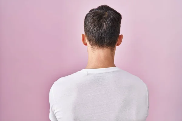 Caucasian Man Standing Pink Background Standing Backwards Looking Away Crossed — Stock Photo, Image