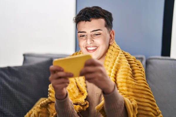 Young Non Binary Man Playing Video Game Smartphone Home — Stock Fotó
