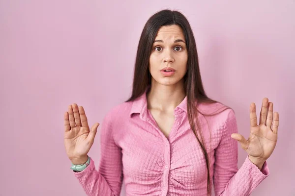 Young Hispanic Woman Standing Pink Background Moving Away Hands Palms — Stock Photo, Image
