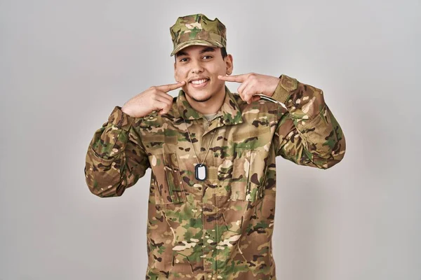 Young Arab Man Wearing Camouflage Army Uniform Smiling Cheerful Showing — Stock Photo, Image