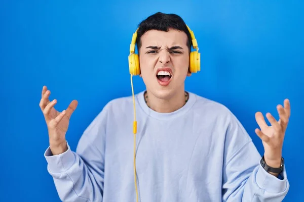 Non Binary Person Listening Music Using Headphones Crazy Mad Shouting — Stock Photo, Image