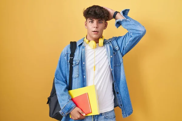Hispanic Teenager Wearing Student Backpack Holding Books Crazy Scared Hands — Stock Photo, Image