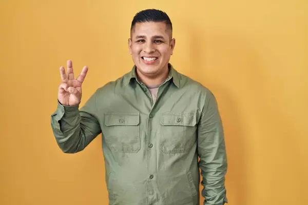 Hispanic Young Man Standing Yellow Background Showing Pointing Fingers Number — Stock Photo, Image