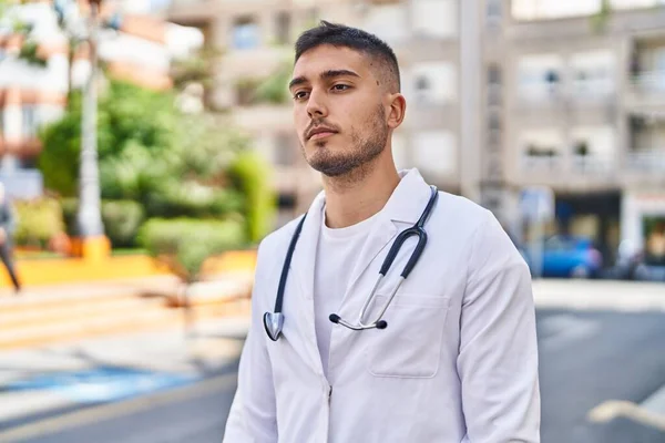 Young Hispanic Man Doctor Standing Relaxed Expression Park —  Fotos de Stock