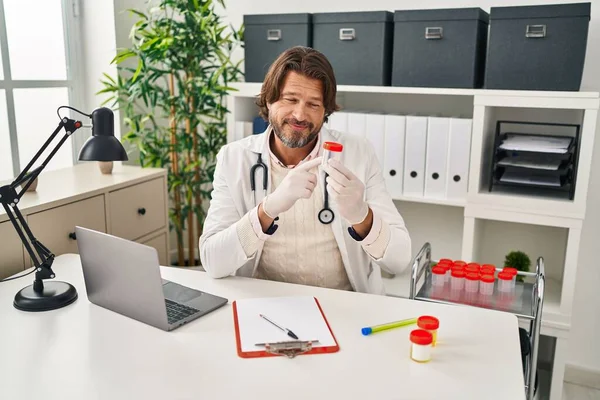 Middle Age Man Doctor Holding Empty Test Tube Clinic — Stock Photo, Image