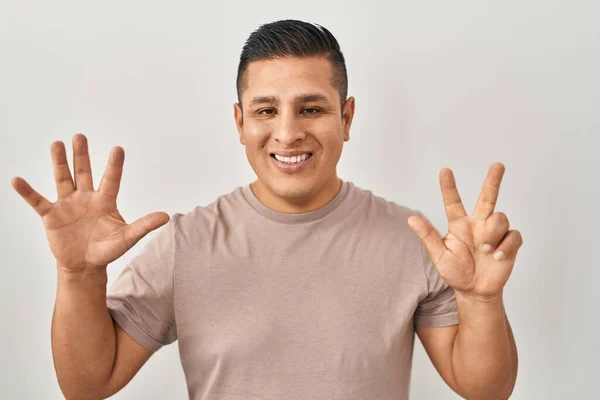 Hispanic Young Man Standing White Background Showing Pointing Fingers Number — Stock Photo, Image