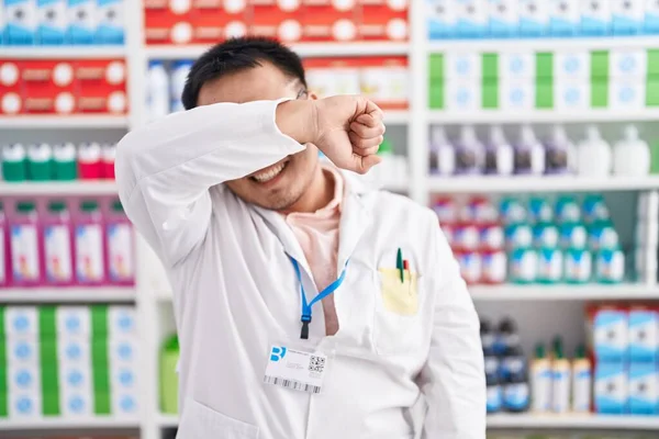 Chinese Young Man Working Pharmacy Drugstore Covering Eyes Arm Smiling — Stock Photo, Image