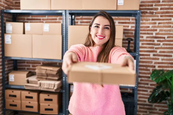 Young Beautiful Hispanic Woman Ecommerce Business Worker Holding Package Office — Photo