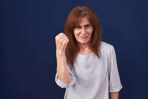 Middle Age Woman Standing Blue Background Angry Mad Raising Fist — Stock Photo, Image
