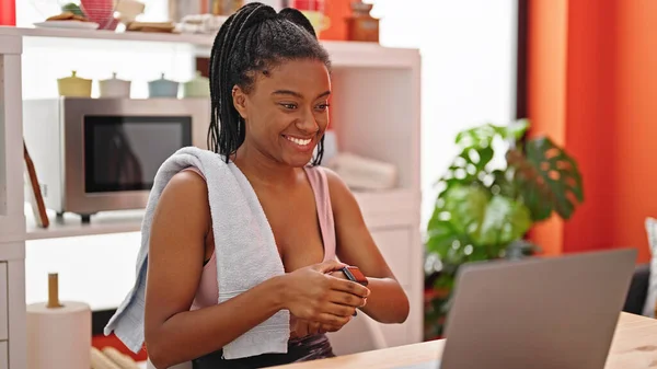 African American Woman Having Video Call Looking Watch Dinning Room — Stock Photo, Image