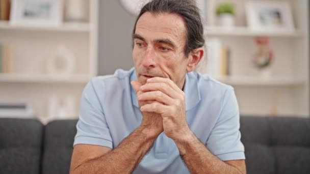 Middle Age Man Sitting Sofa Serious Expression Home — Vídeo de stock