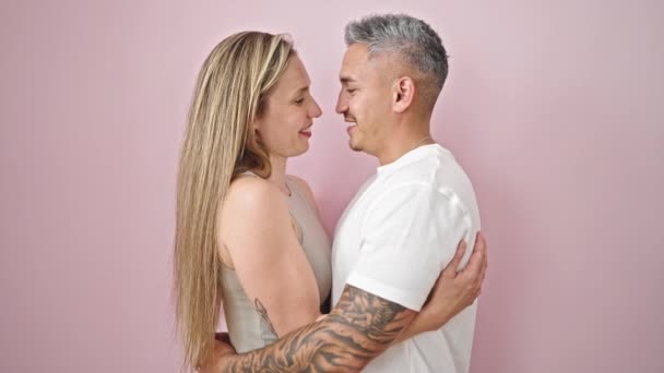 Man Woman Couple Hugging Each Other Kissing Isolated Pink Background — Stock Video