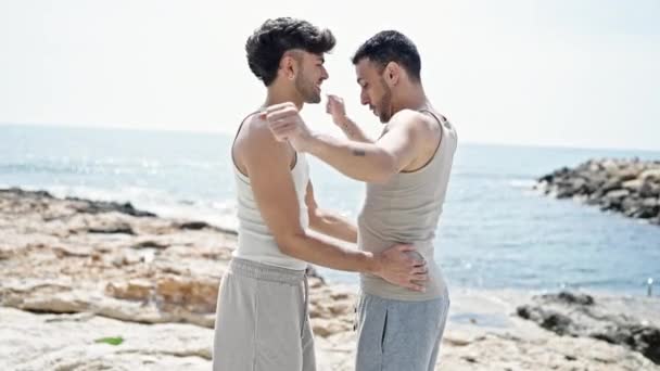 Two Men Couple Smiling Confident Dancing Seaside — Stock Video