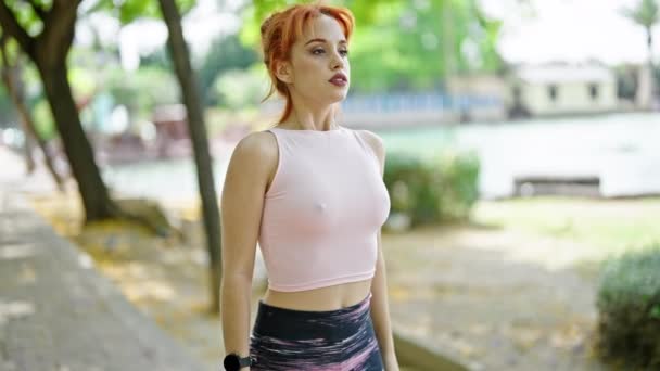 Young Redhead Woman Wearing Sportswear Training Yoga Exercise Park — Stock Video